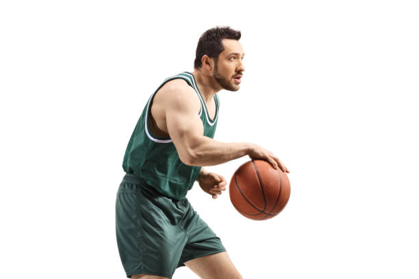 istock Basketball player running with a ball 1385056752
