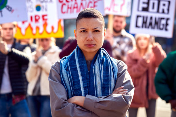 istock Group Of Protestors With Placards On Demonstration March Against Climate Chane 1385063937