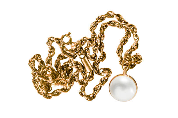 istock Gold necklace isolated 1385064954