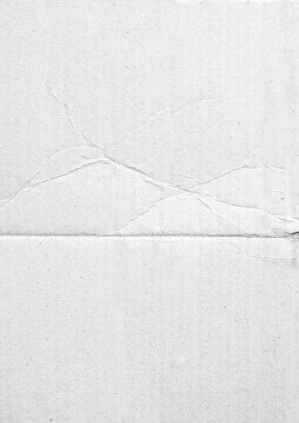 istock folded paper for poster texture. Blank white crumpled and wrinkled paper template for background 1385065026