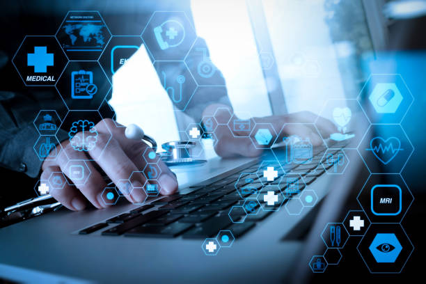 istock Doctor working at workspace with laptop computer in medical workspace office 1385065181