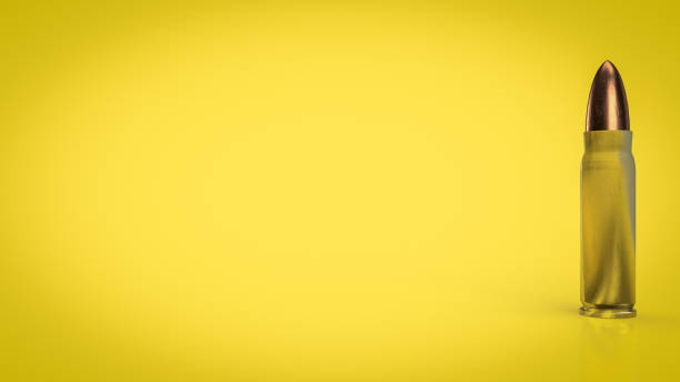 istock The bullet on yellow background for creative concept 3d rendering 1385071308