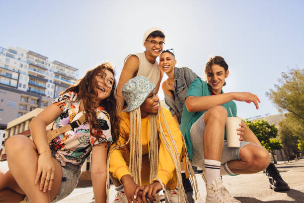 istock Smiling friends having fun outdoors 1385075793
