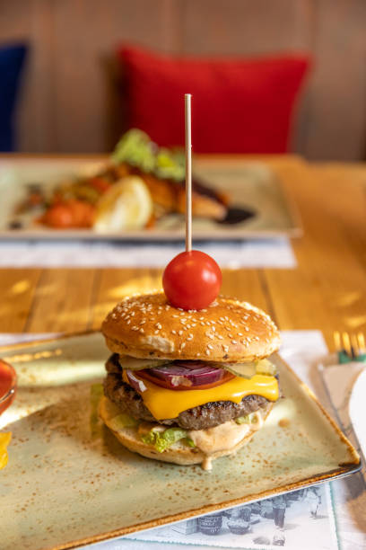 istock Delicious burger served in the restaurant 1385075923
