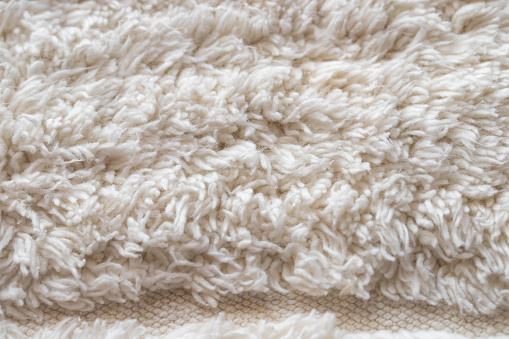 Close-up macro white doormat.