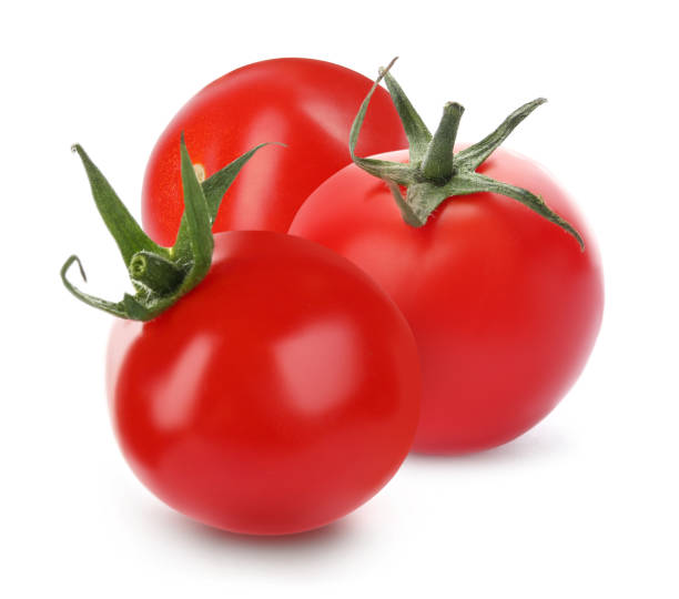 istock Whole red fresh tomatoes on white background 1385079563