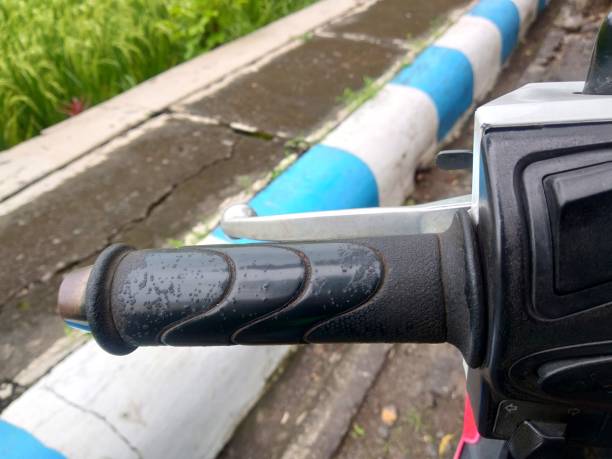 istock Handle hand of motorcycle steering Closeup shot 1385080221