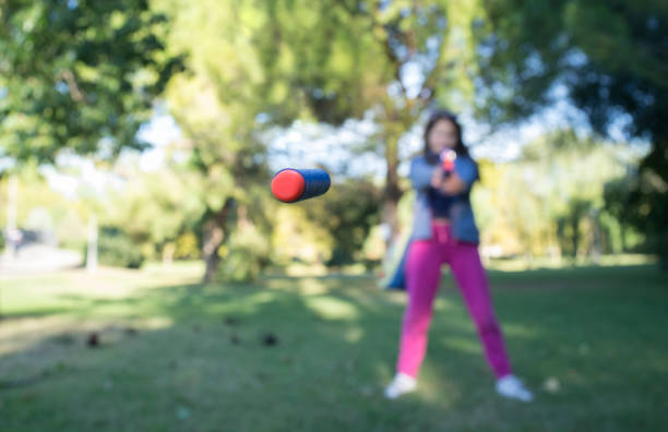 istock 6 years little boy shooting with pistol 1385080248