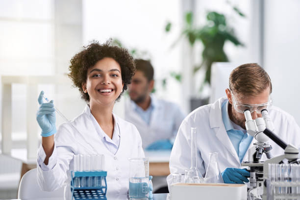 staff of the scientific laboratory is working on the creation of new drugs stock photo