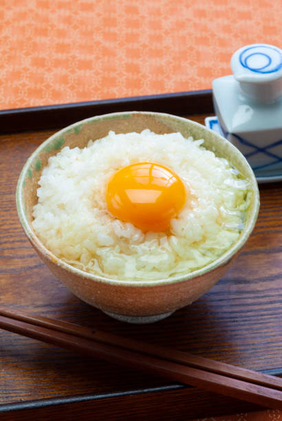 istock Raw egg on the rice with soy sauce 1385085966