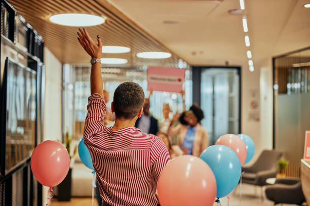 istock Welcome party for businessperson who was absent from work 1385088055