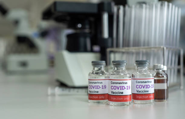 istock Prototype vaccine against covid 19 coronavirus in medical science lab 1385088941
