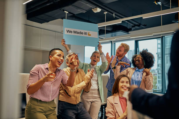 istock Colleagues rejoice because their coworker return to work 1385090617