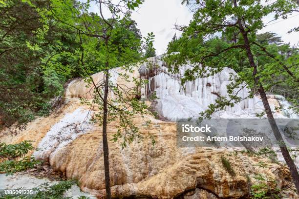 The White Whale Rock In Bagni San Filippo Are Covered With White Stalactites And Stalagmites From Thermal Water Tuscany Italy Stock Photo - Download Image Now