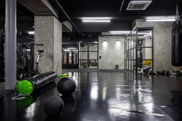 istock Modern empty gym with sports equipment 1385093231