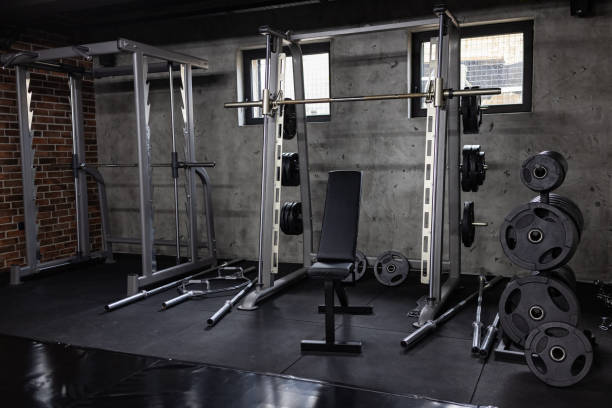 istock Sports exercising equipment in the empty gym 1385093232