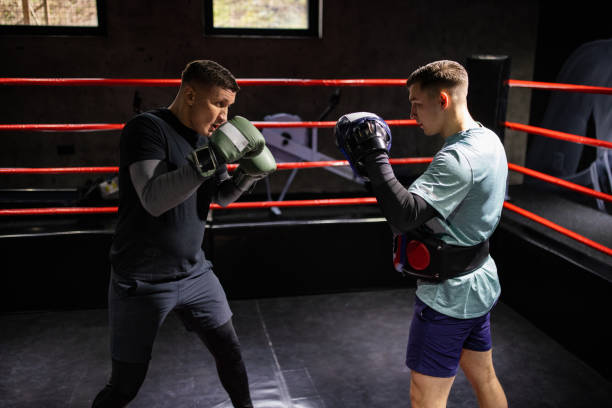 istock Boxers Caucasian ethnicity sparring together 1385095757