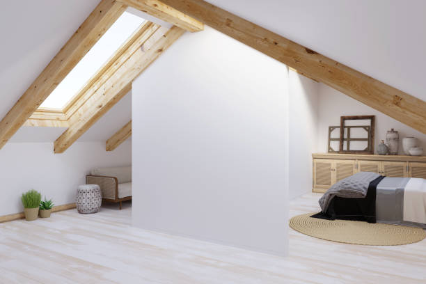 3d render un loft moderno y luminoso con una pared blanca en blanco iluminada por la luz del sol desde la ventana de la buhardilla con vigas de madera, pinturas enmarcadas y jarrones en una cómoda de madera con una alfombra redonda cerca de la cama.
