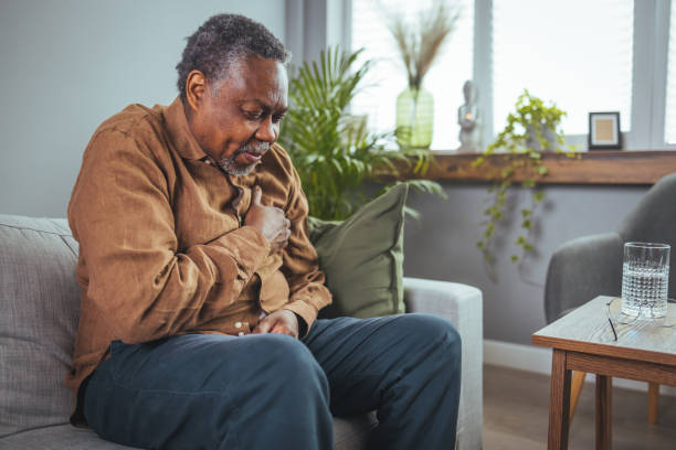 istock Upset older man touching chest 1385099290
