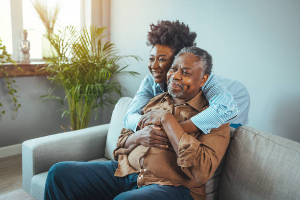 istock Portrait of a daughter holding her elderly father 1385099607