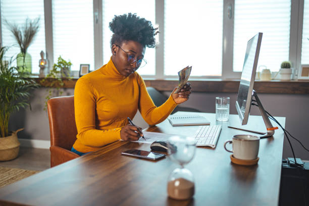 istock Confident businesswoman working with project statistics 1385099703