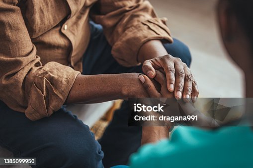 istock Closeup of a support hands. 1385099950