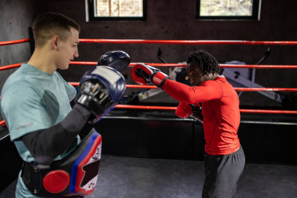 istock Boxer Black ethnicity, sparring with a Caucasian boxer 1385100798