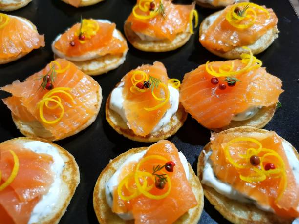 istock Smoked salmon on blinis, festive meal 1385103534