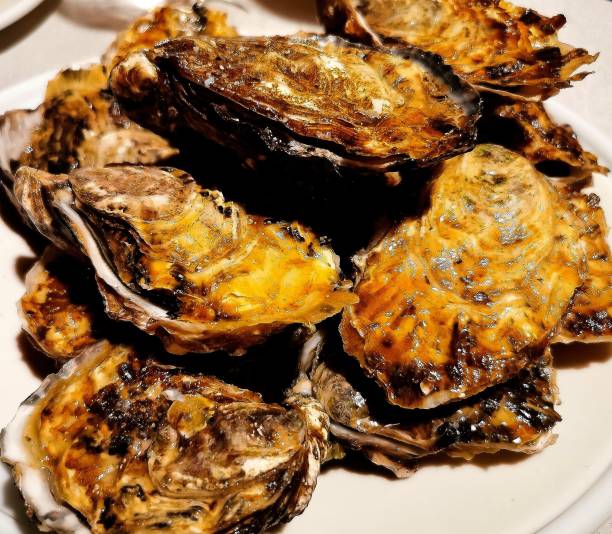 istock Oysters, gourmet meals, holiday meals 1385103568