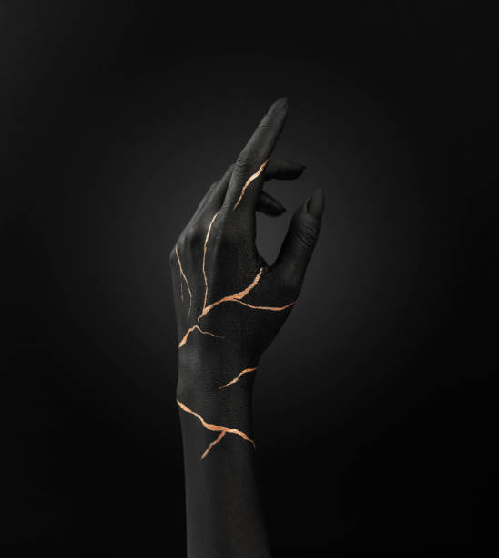 istock woman hand painted black 1385105167