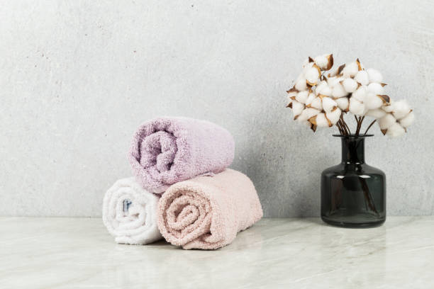 istock towels on marble floor next to cotton 1385105231
