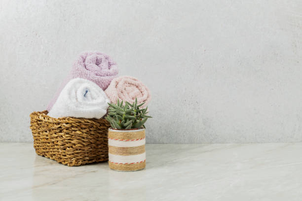 istock towels in wicker basket 1385105260