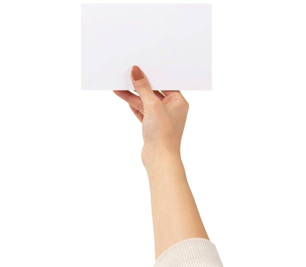 istock woman holding card on white background 1385106279