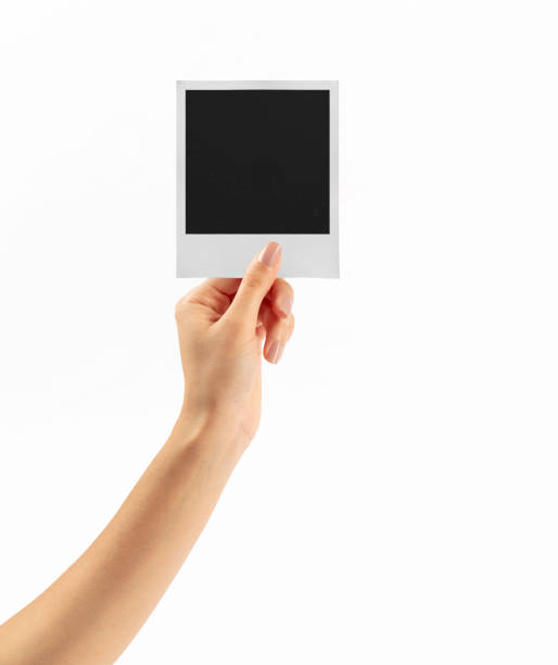 istock woman holding card on white background 1385106551