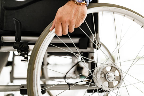 istock Unrecognizable man in a wheelchair on the move. 1385107043