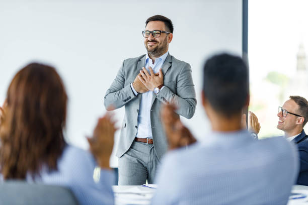 istock Congratulating on successful presentation in the office! 1385107859