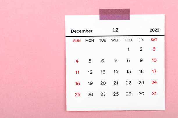 istock December 2022 calendar on pink background. 1385109896