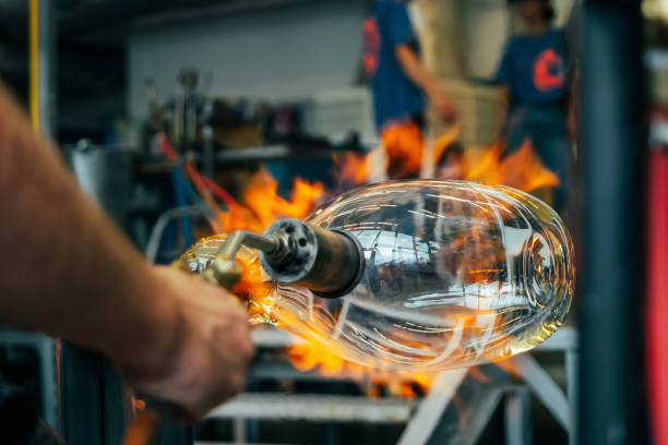 istock Creating the heavy glass bowl by traditional method 1385112185