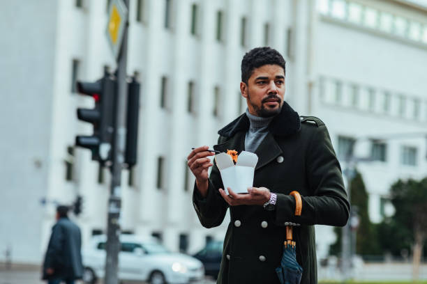 istock Lunch break at the city streets 1385112209