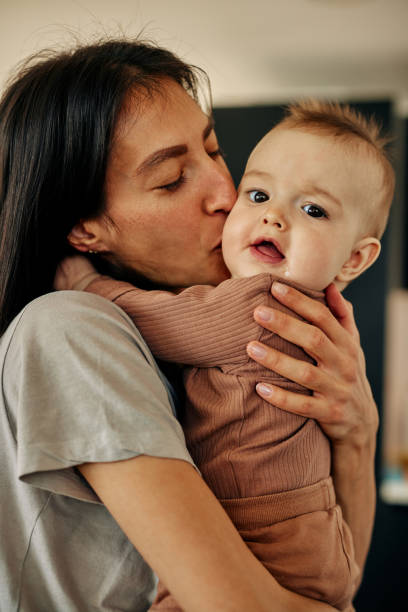 istock Mom spends time with baby boy 1385112751