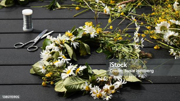 Creating Flower Crown For Midsummer Eve In Sweden Stock Photo - Download Image Now - Floral Crown, Summer Solstice, Summer