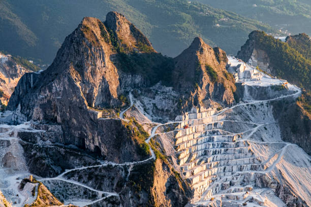 Carrara Marble Quarries (Tuscany, Italy) Carrara marble quarries on the Apuan Alps in Carrara, a locality world-famous for its white marble quarry stock pictures, royalty-free photos & images