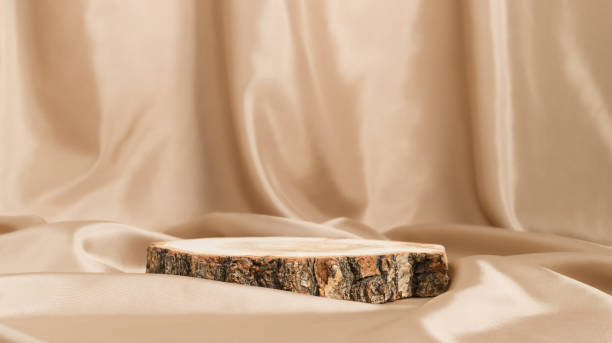 istock Banner with wooden podium on beige textile 1385117404