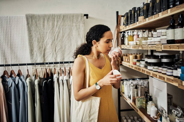 Shot of a young woman shopping in an organic store stock photo