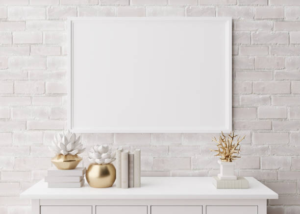 istock Empty horizontal picture frame on white brick wall in modern living room. Mock up interior in minimalist, scandinavian style. Free, copy space for picture, poster. Console, sculptures. 3D rendering. 1385119636