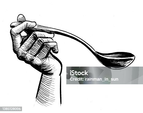 istock Hand with a spoon 1385128006
