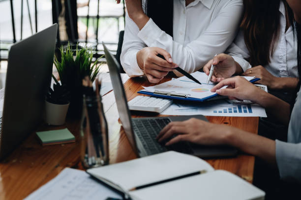 istock Business People Analyzing Statistics Business Documents, Financial Accounting Concept. 1385131067