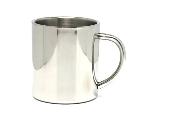 Close up of silver metal aluminum insulated cup mug with handle on white background