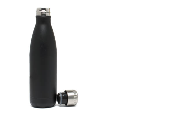 istock Closeup black insulated bottle cap white background 1385131369