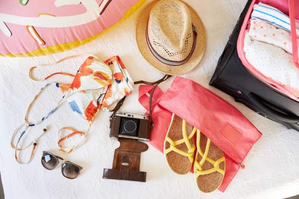 Various items as details or flatlay of a holiday trip or beach vacation